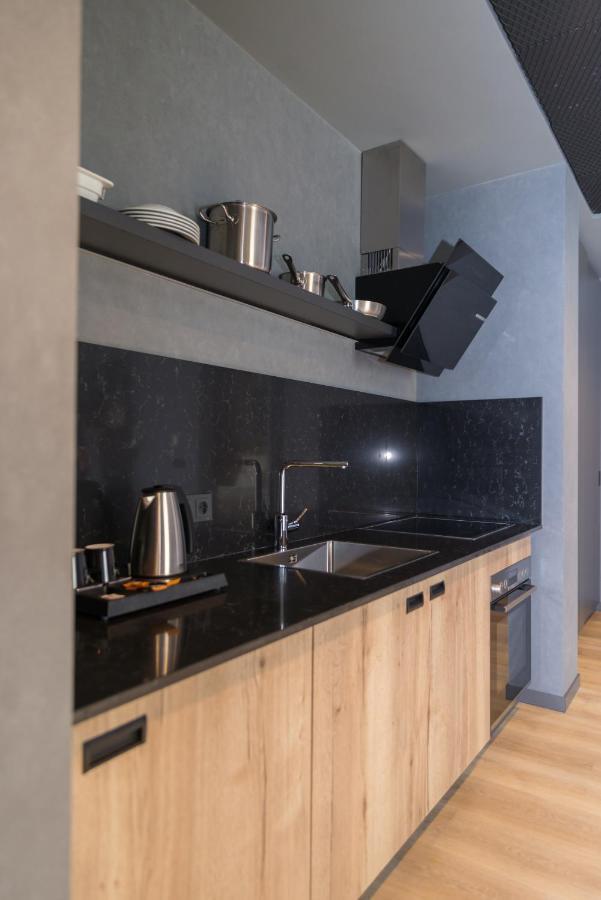 Mk Hotel Tirana Ринас Экстерьер фото A kitchen in a serviced apartment in Paris
