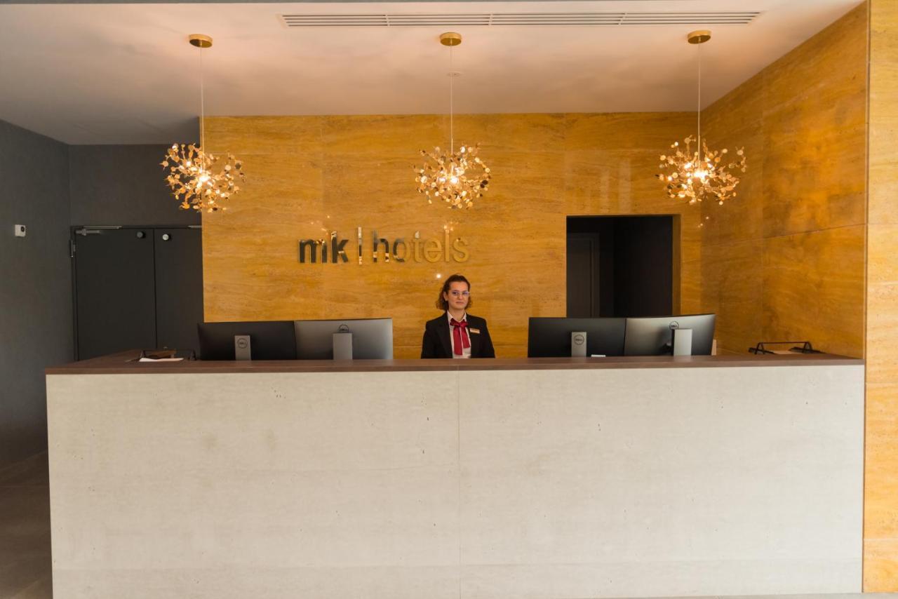 Mk Hotel Tirana Ринас Экстерьер фото Reception desk at a hotel
